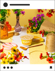 photo of brekki surrounded by flowers
