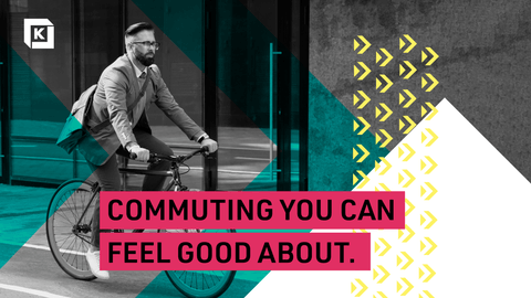 A biker riding through Kendall Square with words "Commuting you can feel good about."