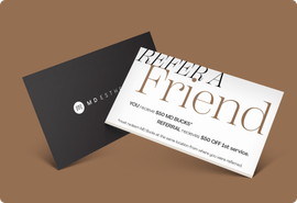 MD Esthetics branded referral card